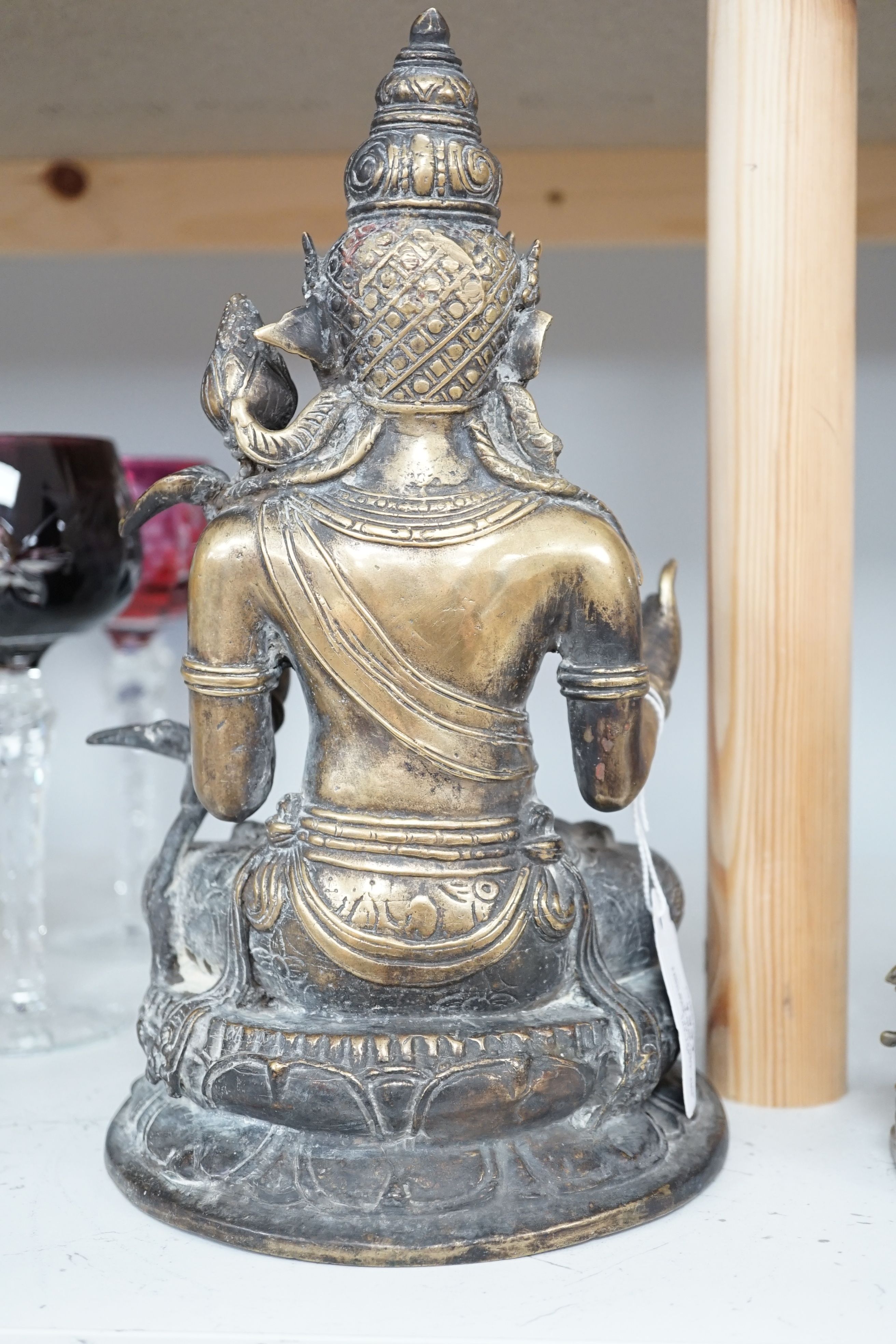Two Buddhist bronze figures, tallest, 28cm high